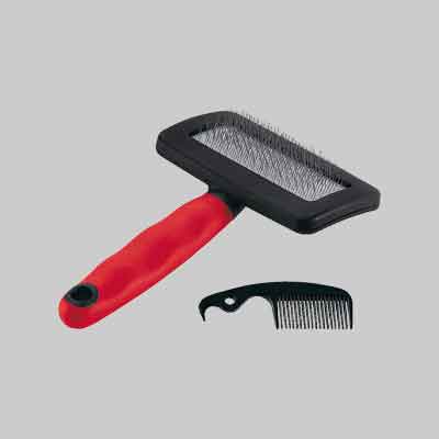 SPAZZOLA CARDATRICE PER CANI E GATTI Tg. M - cm 16x9,8x3,3h. Prezzo per Pezzo.